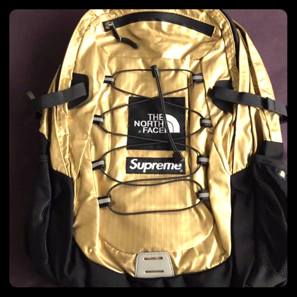 Supreme x north face gold backpack
